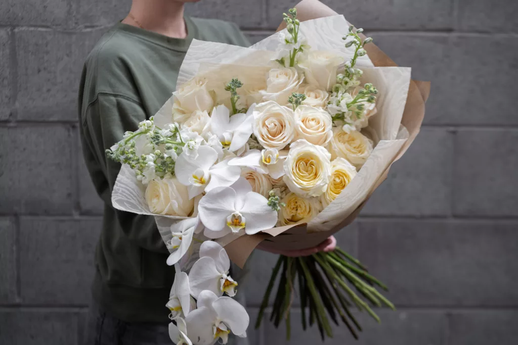 Opulent white flower bouquet with orchids2