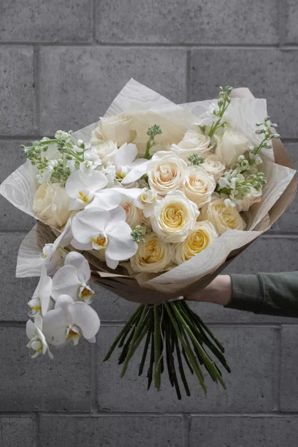 Opulent white flower bouquet with orchids3