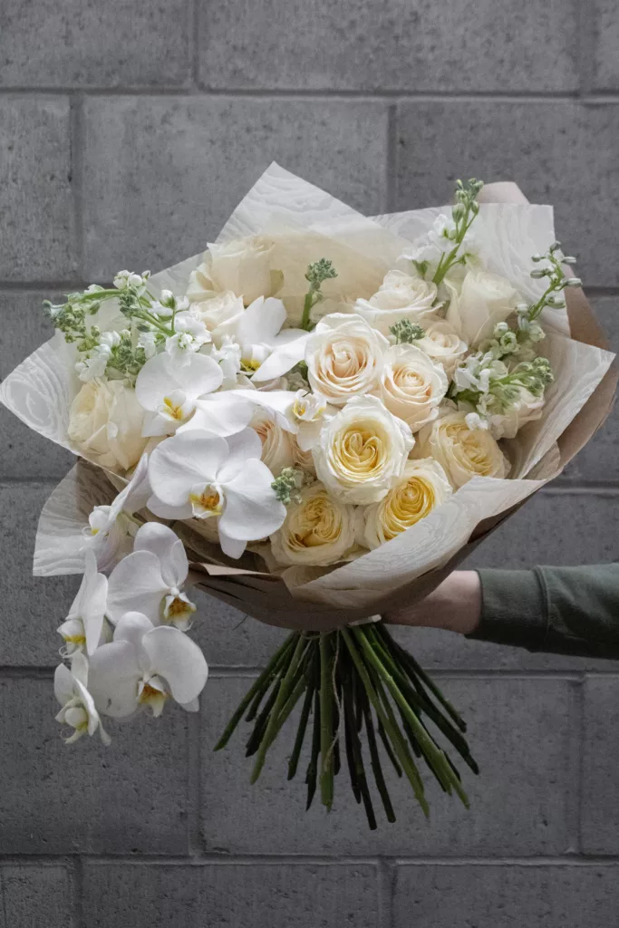 Opulent white flower bouquet with orchids3