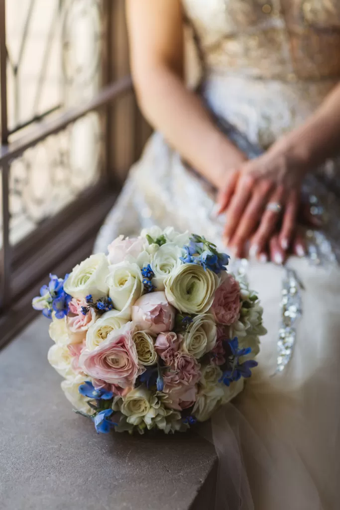 Round bridal bouquet with blue