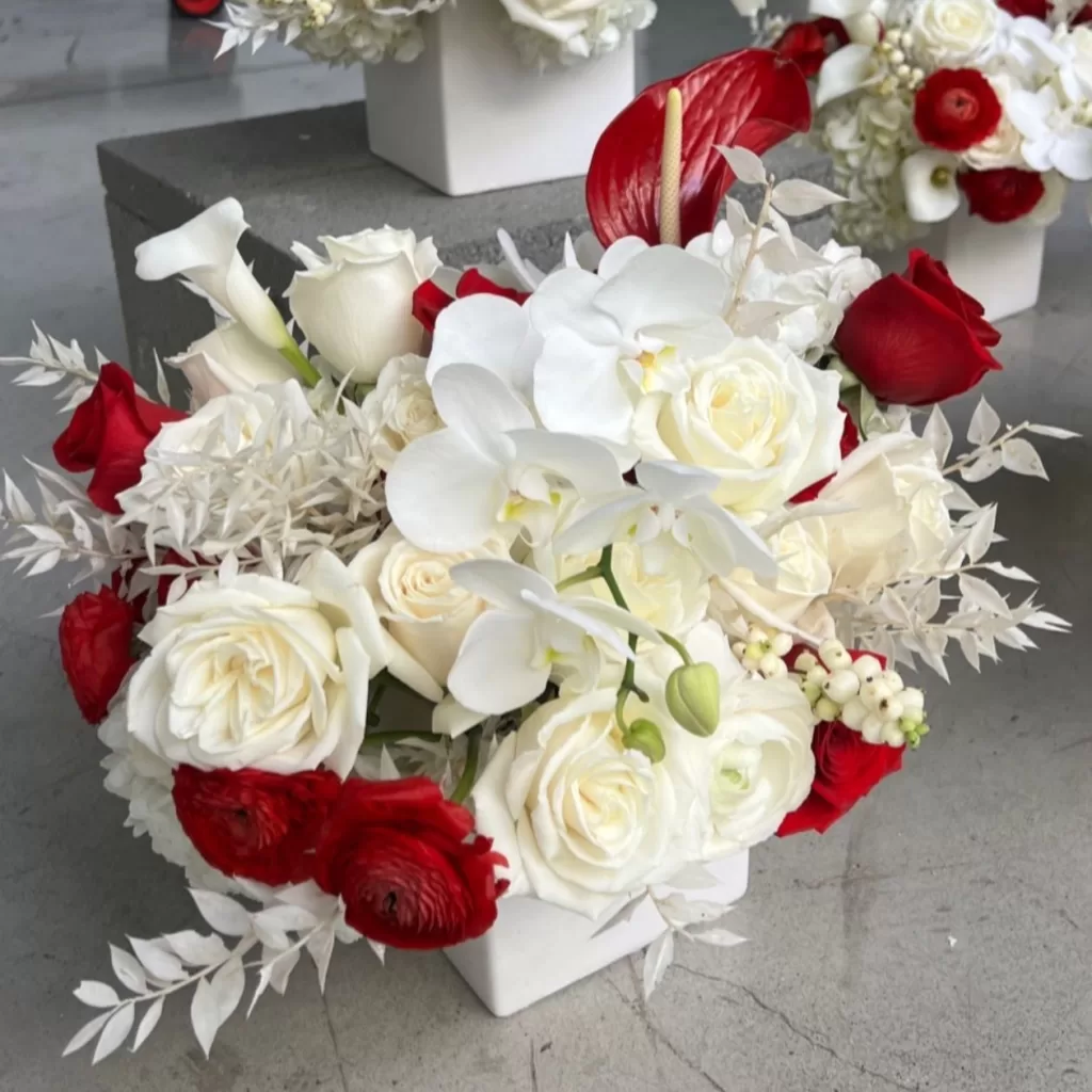 red and white corporate event flowers